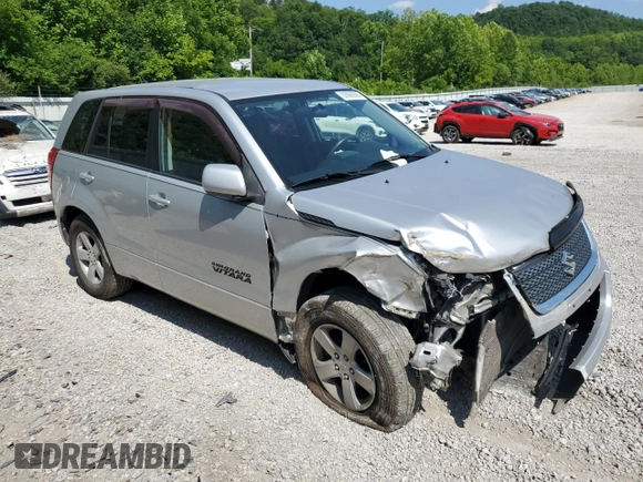 2011 Suzuki Grand Vitara Premium z VIN JS3TD0D29B4103041, wystawiony jako Copart lot #62066985 z przebiegiem 219 727 mil mil oraz Szkoda całkowita • Salvage title. Historia ofert i sprzedaży dostępna na DreamBid. Obrazek 4.