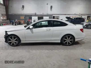 2015 Mercedes-Benz C 250 with VIN WDDGJ4HB5FG375879, listed as a IAAI auction lot 42454524 with 50,588 mi miles and . Bid and sale history available at DreamBid. Image 14.