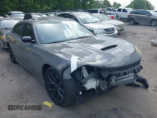 2019 Dodge Charger R/T z VIN 2C3CDXCT7KH721662, wystawiony jako IAAI lot #42179489 z przebiegiem 112 946 mil mil oraz . Historia ofert i sprzedaży dostępna na DreamBid. Obrazek 1.