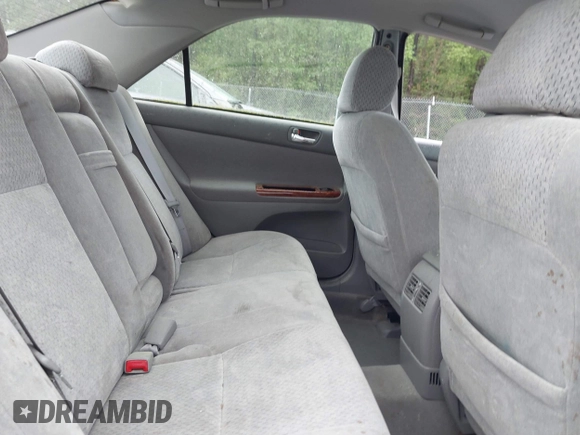 2003 Toyota Camry LE with VIN 4T1BE32K63U755835, listed as a IAAI auction lot 41976402 with 215,788 mi miles and . Bid and sale history available at DreamBid. Image 8.