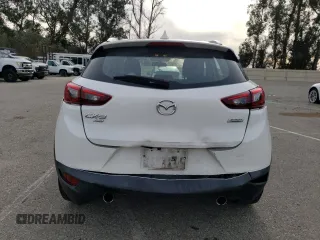 2016 Mazda CX-3 Touring with VIN JM1DKBC71G0123543, listed as a Copart auction lot 84657294 with 113,080 mi miles and Salvage Title. Bid and sale history available at carsss.com. Image 6.