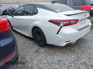 2022 Toyota Camry TRD with VIN 4T1KZ1AK4NU068897, listed as a IAAI auction lot 41851894 with 45,160 mi miles and . Bid and sale history available at DreamBid. Image 3.