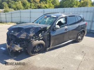 2020 BMW X5 M50i with VIN 5UXJU4C05LL228167, listed as a Copart auction lot 70390194 with Not Provided miles and Salvage Title. Bid and sale history available at DreamBid. Image 1.