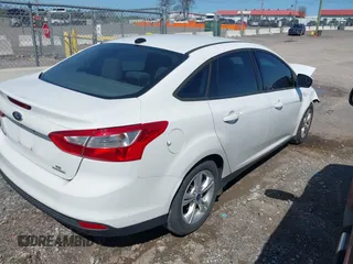 2014 Ford Focus SE with VIN 1FADP3F28EL370650, listed as a IAAI auction lot 41989922 with 142,599 mi miles and . Bid and sale history available at carsss.com. Image 4.