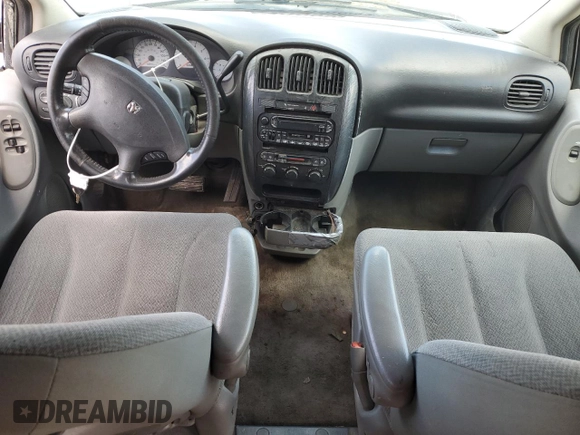 2005 Dodge Caravan SXT z VIN 2D4GP44L15R380469, wystawiony jako Copart lot #58800775 z przebiegiem Nie podano mil oraz Szkoda całkowita • Salvage title. Historia ofert i sprzedaży dostępna na DreamBid. Obrazek 8.