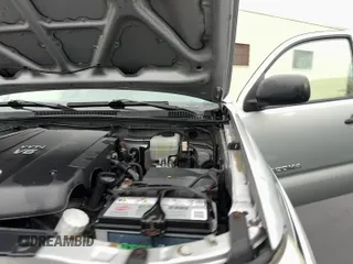 2011 Toyota Tacoma z VIN 3TMLU4EN4BM056696, wystawiony jako Copart lot #91099915 z przebiegiem 287 736 mil mil oraz Czysty tytuł • Clean title. Historia ofert i sprzedaży dostępna na DreamBid. Obrazek 11.