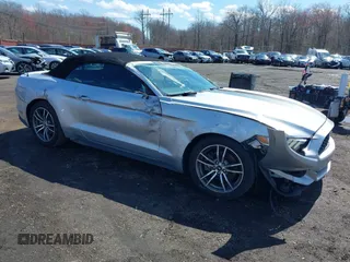 2016 Ford Mustang EcoBoost Premium with VIN 1FATP8UH1G5325654, listed as a IAAI auction lot 41879221 with 90,210 mi miles and . Bid and sale history available at carsss.com. Image 1.