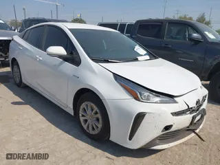 2021 Toyota Prius L Eco with VIN JTDKAMFU6M3141263, listed as a IAAI auction lot 40593951 with 95,921 mi miles. Bid and sale history available at carsss.com. Image 1.