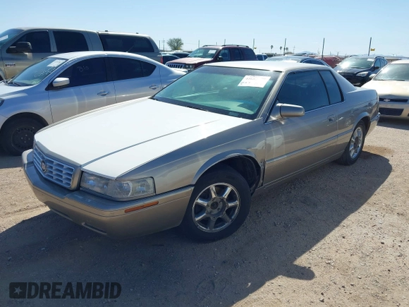 2001 Cadillac Eldorado Touring ETC z VIN 1G6ET12971B109319, wystawiony jako IAAI lot #41682779 z przebiegiem 147 515 mil mil oraz . Historia ofert i sprzedaży dostępna na DreamBid. Obrazek 2.