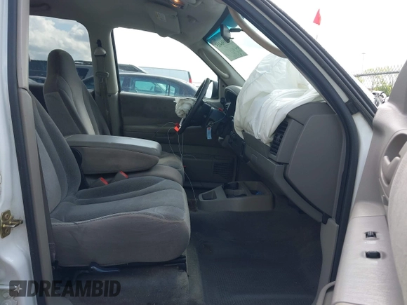 2004 Dodge Dakota SLT with VIN 1D7HG48N14S709199, listed as a IAAI auction lot 42096415 with 188,907 mi miles and . Bid and sale history available at DreamBid. Image 5.