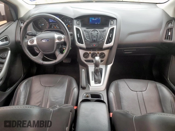 2014 Ford Focus SE z VIN 1FADP3K24EL187042, wystawiony jako Copart lot #57636395 z przebiegiem 105 918 mil mil oraz Szkoda całkowita • Salvage title. Historia ofert i sprzedaży dostępna na DreamBid. Obrazek 8.