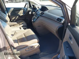 2012 Honda Odyssey Touring with VIN 5FNRL5H9XCB077351, listed as a IAAI auction lot 42045976 with 146,290 mi miles and . Bid and sale history available at DreamBid. Image 5.