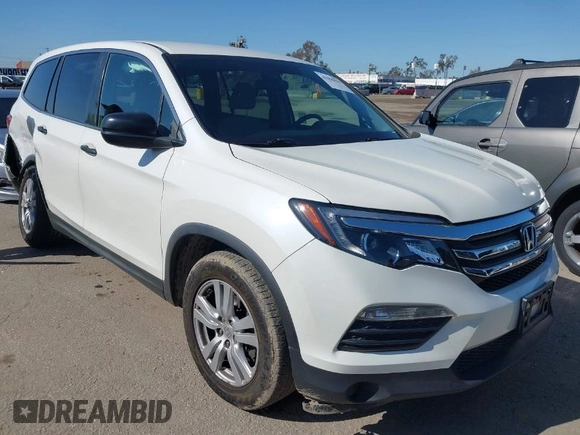2016 Honda Pilot LX with VIN 5FNYF5H12GB051880, listed as a IAAI auction lot 41965816 with 112,705 mi miles and . Bid and sale history available at DreamBid. Image 1.