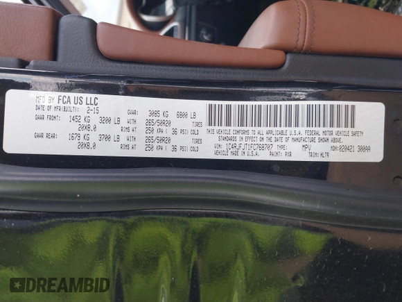 2015 Jeep Grand Cherokee Summit with VIN 1C4RJFJT1FC768707, listed as a IAAI auction lot 41863454 with 122,564 mi miles. Bid and sale history available at carsss.com. Image 9.