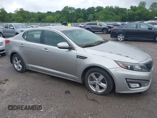 2014 Kia Optima LX z VIN 5XXGM4A71EG328023, wystawiony jako IAAI lot #42264341 z przebiegiem 217 499 mil mil oraz . Historia ofert i sprzedaży dostępna na DreamBid. Obrazek 1.