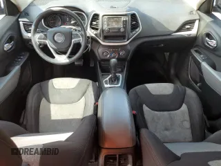 2014 Jeep Cherokee Sport with VIN 1C4PJLAB7EW123442, listed as a Copart auction lot 52294125 with 189,047 mi miles and Salvage Title. Bid and sale history available at DreamBid. Image 8.