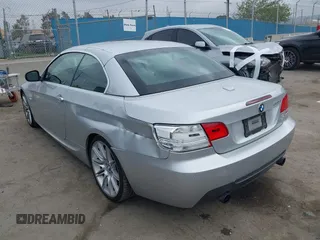 2010 BMW 3 Series 335i with VIN WBAWL7C53AP474127, listed as a IAAI auction lot 41871518 with 111,136 mi miles. Bid and sale history available at carsss.com. Image 3.