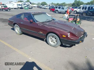 1982 Datsun 280ZX z VIN JN1HZ04S9CX455903, wystawiony jako IAAI lot #42465455 z przebiegiem Nie podano mil oraz . Historia ofert i sprzedaży dostępna na DreamBid. Obrazek 1.
