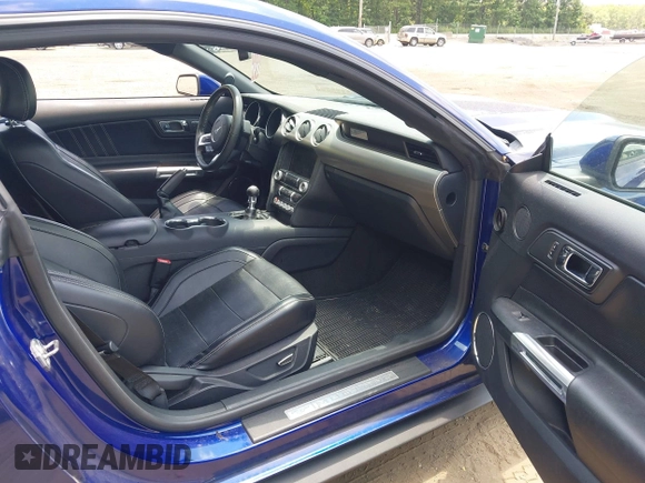 2015 Ford Mustang EcoBoost z VIN 1FA6P8TH9F5361668, wystawiony jako IAAI lot #42616707 z przebiegiem 73 798 mil mil oraz . Historia ofert i sprzedaży dostępna na DreamBid. Obrazek 5.