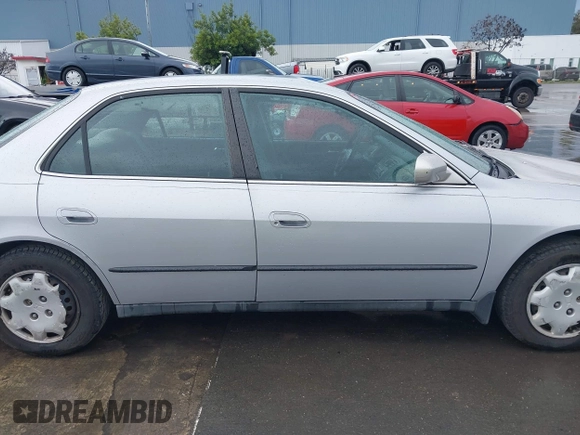 1999 Honda Accord LX z VIN 1HGCG5645XA023392, wystawiony jako IAAI lot #41525751 z przebiegiem 214 850 mil mil oraz . Historia ofert i sprzedaży dostępna na DreamBid. Obrazek 13.