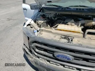 2023 Ford F-150 XL с VIN 1FTFX1E55PKE09559, выставлен на аукционе Copart как лот 68850295 с пробегом 59 542 миль миль и Списание • Salvage title. История ставок и продаж доступна на DreamBid. Изображение 13.