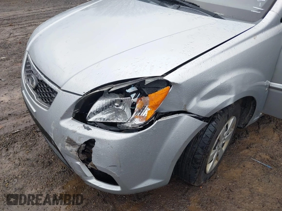 2010 Kia Rio LX with VIN KNADH4A37A6645279, listed as a IAAI auction lot 40856780 with 165,385 mi miles. Bid and sale history available at carsss.com. Image 6.