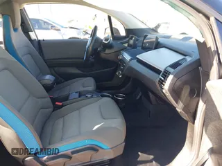 2017 BMW i3 z VIN WBY1Z8C54HV889592, wystawiony jako IAAI lot #41820029 z przebiegiem 50 530 mil mil oraz . Historia ofert i sprzedaży dostępna na DreamBid. Obrazek 5.