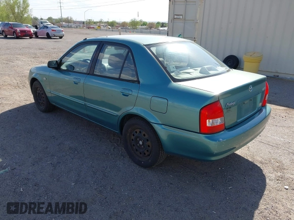 2002 Mazda Protege DX z VIN JM1BJ225021606891, wystawiony jako IAAI lot #42011997 z przebiegiem 134 758 mil mil oraz . Historia ofert i sprzedaży dostępna na DreamBid. Obrazek 3.