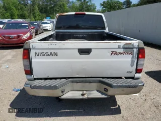 1999 Nissan Frontier XE with VIN 1N6DD26S3XC326231, listed as a Copart auction lot 51710615 with 228,174 mi miles and Salvage title. Bid and sale history available at DreamBid. Image 6.