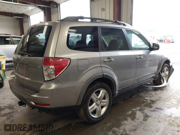 2009 Subaru Forester X with VIN JF2SH63619H731296, listed as a IAAI auction lot 42294036 with 184,739 mi miles and . Bid and sale history available at DreamBid. Image 4.