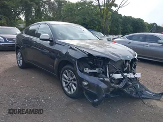 2019 BMW X6 xDrive35i with VIN 5UXKU2C52K0Z63337, listed as a IAAI auction lot 40364520 with 94,015 mi miles. Bid and sale history available at carsss.com. Image 1.