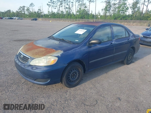2005 Toyota Corolla CE with VIN 1NXBR32E25Z563569, listed as a IAAI auction lot 42100384 with 243,610 mi miles and . Bid and sale history available at DreamBid. Image 2.
