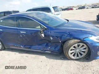 2017 Tesla Model S 100D with VIN 5YJSA1E28HF217489, listed as a IAAI auction lot 42128388 with Not provided miles and . Bid and sale history available at DreamBid. Image 6.