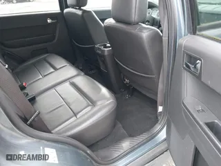 2010 Ford Escape Limited with VIN 1FMCU9EG1AKB89593, listed as a IAAI auction lot 41993888 with 121,175 mi miles. Bid and sale history available at carsss.com. Image 8.