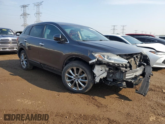 2014 Mazda CX-9 Grand Touring with VIN JM3TB3DVXE0443852, listed as a Copart auction lot 59106525 with 101,969 mi miles and Salvage title. Bid and sale history available at DreamBid. Image 4.