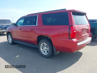 2015 Chevrolet Suburban LT with VIN 1GNSKJKC5FR726299, listed as a IAAI auction lot 42740904 with 96,700 mi miles and . Bid and sale history available at DreamBid. Image 3.