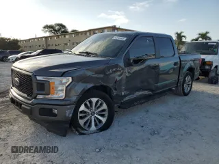 2018 Ford F-150 XL with VIN 1FTEW1CP8JFD24735, listed as a Copart auction lot 52548045 with 154,506 mi miles and Salvage title. Bid and sale history available at DreamBid. Image 1.