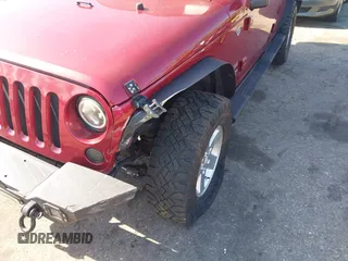 2011 Jeep Wrangler Unlimited Sport with VIN 1J4BA3H18BL598323, listed as a IAAI auction lot 41958043 with 154,354 mi miles. Bid and sale history available at carsss.com. Image 6.