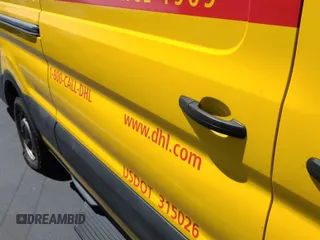2019 Ford Transit z VIN 1FTYR3XM3KKA38669, wystawiony jako IAAI lot #42619599 z przebiegiem 135 929 mil mil oraz . Historia ofert i sprzedaży dostępna na DreamBid. Obrazek 19.