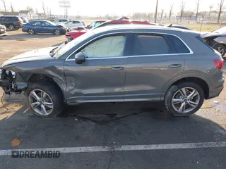 2021 Audi Q3 S line Premium with VIN WA1DECF37M1075942, listed as a IAAI auction lot 41192874 with 50,670 mi miles. Bid and sale history available at carsss.com. Image 14.