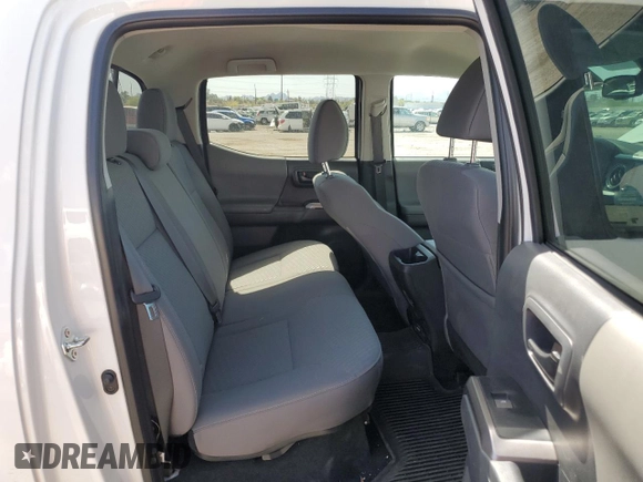 2023 Toyota Tacoma SR5 z VIN 3TMAZ5CN3PM219718, wystawiony jako Copart lot #55253845 z przebiegiem 18 879 mil mil oraz Szkody całkowita. Historia ofert i sprzedaży dostępna na DreamBid. Obrazek 10.