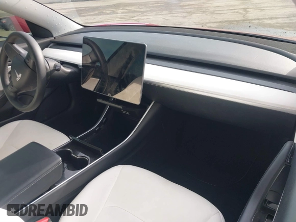 2020 Tesla Model 3 Standard Range Plus with VIN 5YJ3E1EA9LF718027, listed as a IAAI auction lot 41679320 with 68,987 mi miles. Bid and sale history available at carsss.com. Image 5.