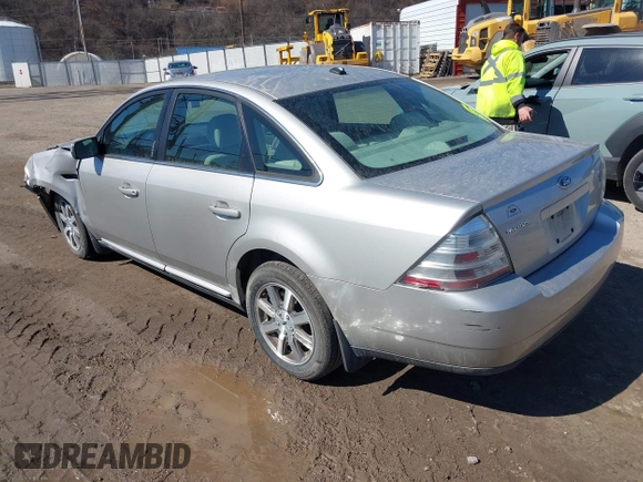 2008 Ford Taurus SEL with VIN 1FAHP27W48G103208, listed as a IAAI auction lot 41675026 with 154,608 mi miles. Bid and sale history available at carsss.com. Image 3.