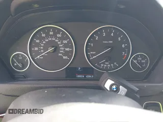 2015 BMW 3 Series 328i with VIN WBA3A5C55FF608159, listed as a IAAI auction lot 41255978 with 199,024 mi miles. Bid and sale history available at carsss.com. Image 7.