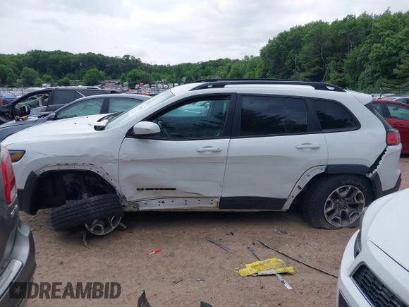 2020 Jeep Cherokee Latitude with VIN 1C4PJMCXXLD578180, listed as a IAAI auction lot 42438023 with 82,845 mi miles and . Bid and sale history available at DreamBid. Image 15.