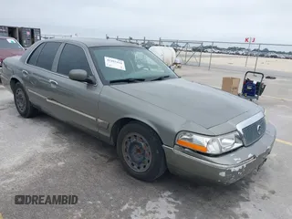 2003 Mercury Grand Marquis GS Convenience z VIN 2MEFM74W83X678151, wystawiony jako IAAI lot #42393410 z przebiegiem 273 966 mil mil oraz . Historia ofert i sprzedaży dostępna na DreamBid. Obrazek 1.
