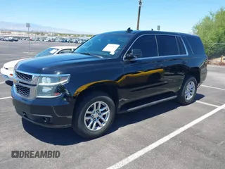 2015 Chevrolet Tahoe Commercial z VIN 1GNLC2EC0FR629983, wystawiony jako IAAI lot #42825604 z przebiegiem 112 410 mil mil oraz . Historia ofert i sprzedaży dostępna na DreamBid. Obrazek 2.