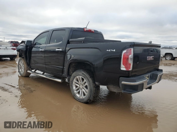 2015 GMC Canyon 4WD SLT with VIN 1GTG6CE38F1262174, listed as a Copart auction lot 80066724 with 154,267 mi miles and Salvage Title. Bid and sale history available at carsss.com. Image 2.