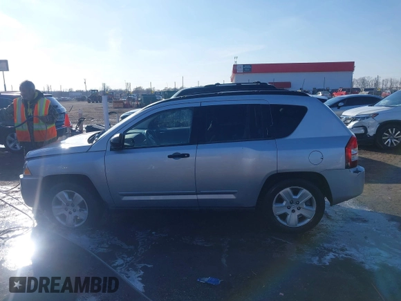 2008 Jeep Compass Sport with VIN 1J8FT47098D665734, listed as a IAAI auction lot 41561801 with 169,446 mi miles. Bid and sale history available at carsss.com. Image 14.