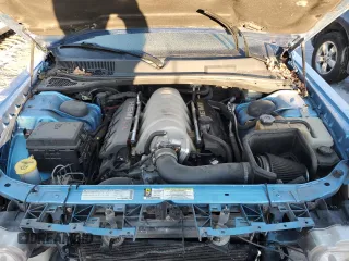 2010 Dodge Challenger SRT-8 with VIN 2B3CJ7DW7AH130521, listed as a Copart auction lot 88990235 with 128,370 mi miles and Salvage title. Bid and sale history available at DreamBid. Image 11.